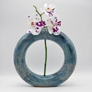 Handmade ceramic ring vase with orchid flower, blue rutile glaze, made in the Isle of Man by JFC Ceramics