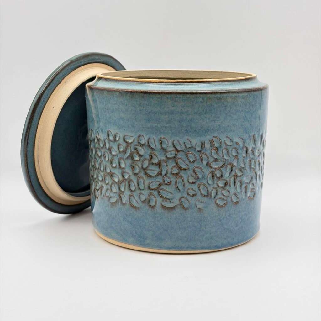 Handmade ceramic lidded jar with textured design in blue rutile glaze, Isle of Man pottery by JFC Ceramics