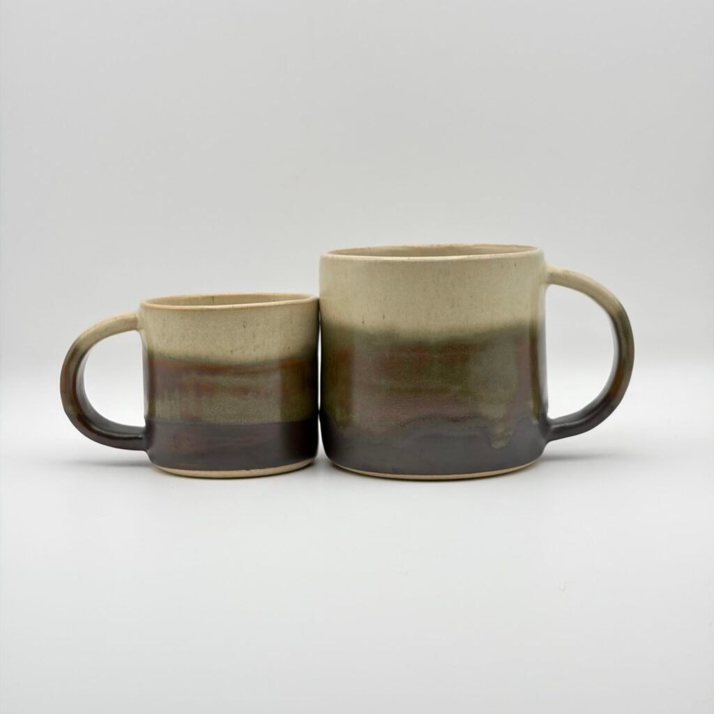 Handmade ceramic ring vase with orchid flower, blue rutile glaze, made in the Isle of Man by JFC Ceramics